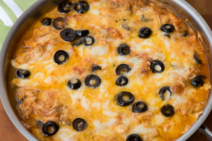 Make chicken enchilada dip ahead of time and pop in hot oven and heat until bubbly. Score! | The Recipe Wench