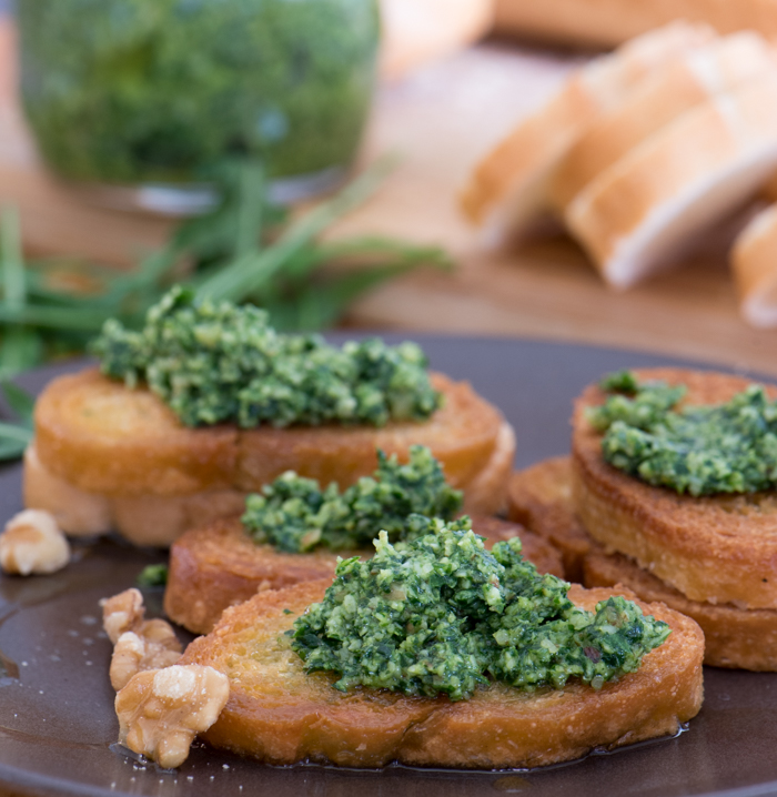 Pesto made with fresh arugula and walnuts makes an easy appetizer. Spread on crostini, put a little on grilled chicken or steak, toss with pasta. Eye opener! | The Recipe Wench