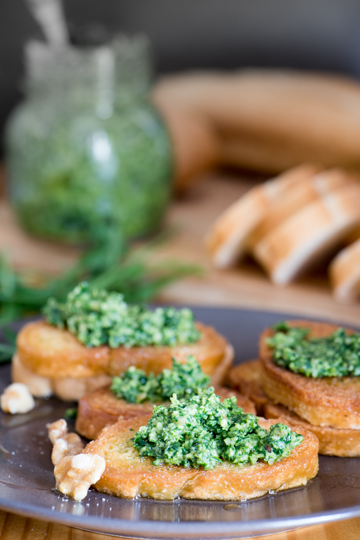 Pesto made with fresh arugula and walnuts makes an easy appetizer. Spread on crostini, put a little on grilled chicken or steak, toss with pasta. Eye opener! | The Recipe Wench
