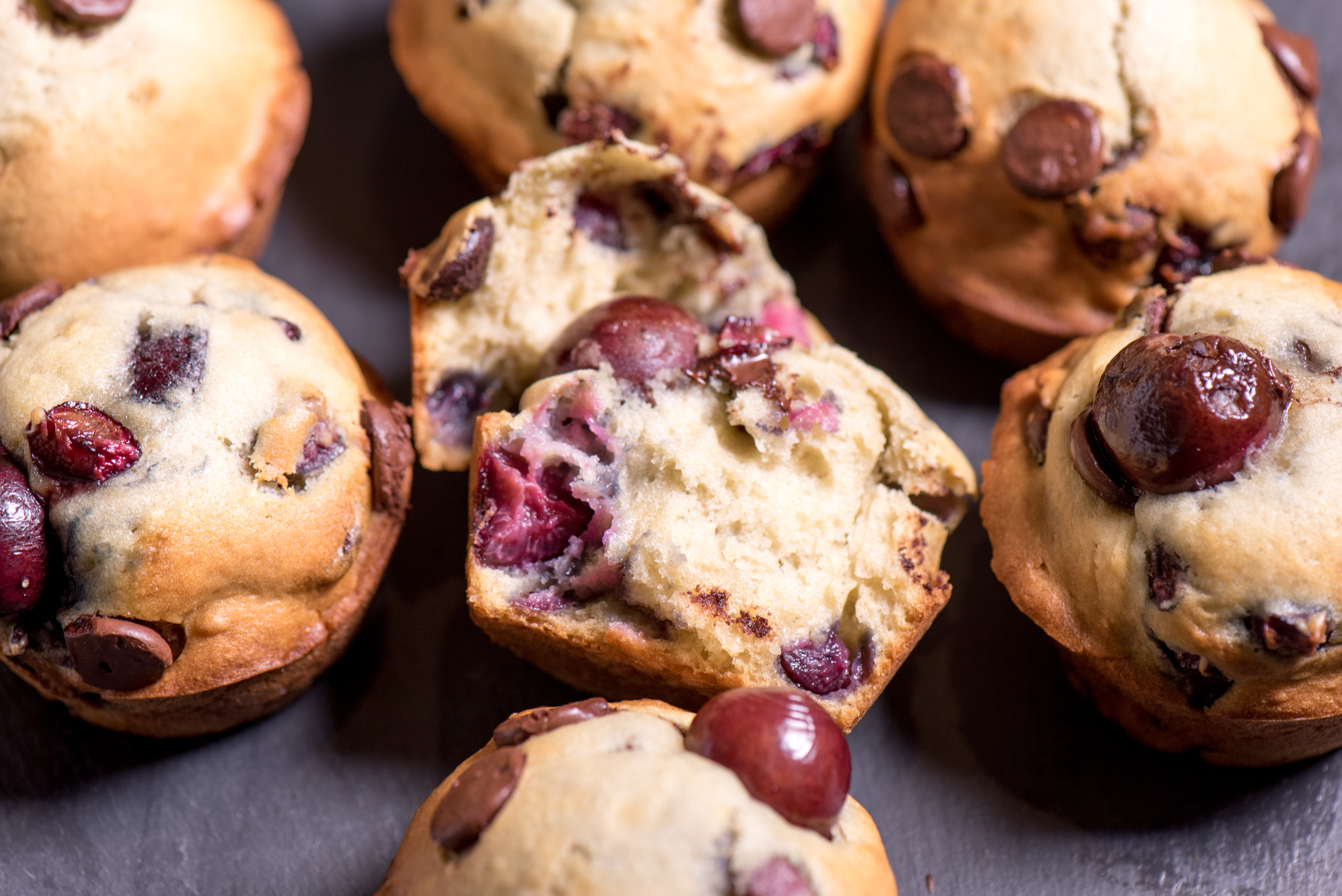 Fresh cherries, rich dark chocolate. What's not to love about these fresh cherry muffins?! | The Recipe Wench