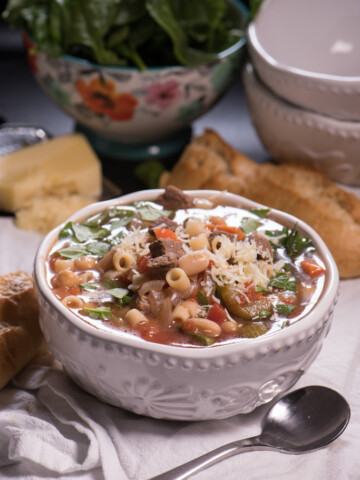 Beef Minestrone is a delicious year-round, versatile soup. Super easy. Feel free to supplement with your favorite seasonal vegetables like zucchini or green beans! | The Recipe Wench