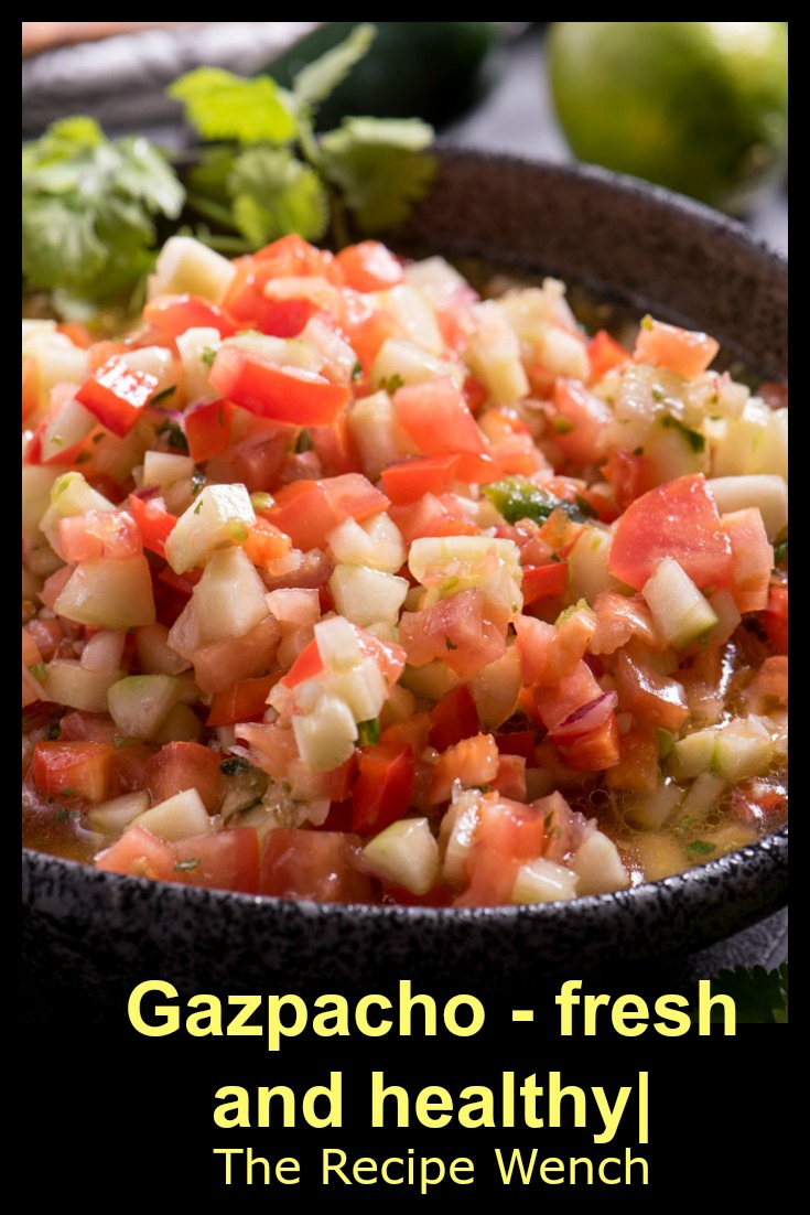 Gazpacho is a super healthy and easy dish -- a little olive oil, seasonings and vegetables. Who wouldn't love that?! | The Recipe Wench