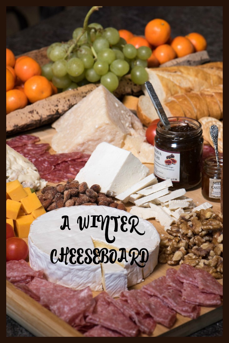 The cheeseboard is an easy eye-appealing appetizer to feed a crowd. Perfect addition to your New Years Eve party! | The Recipe Wench