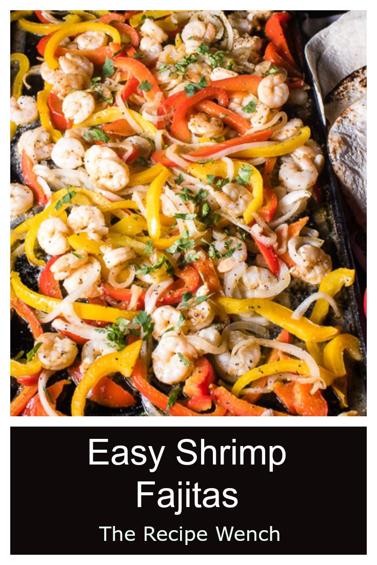 Shrimp fajitas packed full of tender shrimp and healthy veggies. These cook in the oven and are easy to serve family style! | The Recipe Wench